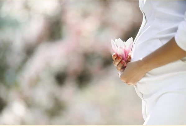 Біль у попереку при вагітності: що важливо знати?